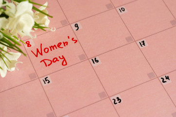 Inscription Happy Women's Day in pink calendar 3