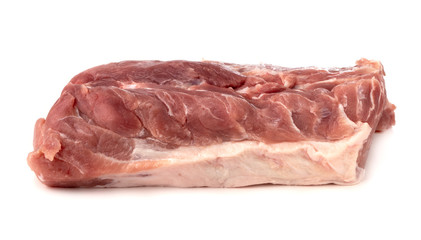 A piece of meat on a white background. Raw piece of pork close-up.
