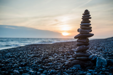 Obraz premium stack of stones on the beach