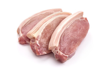 Fresh Pork loin steaks, isolated on white background