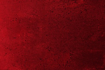 red dotted rough plaster on the desk texture - fantastic abstract photo background