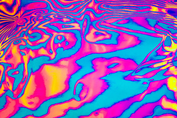 Abstract trendy neon colored psychedelic fluorescent striped zebra textured neon background © Aleksandra Konoplya