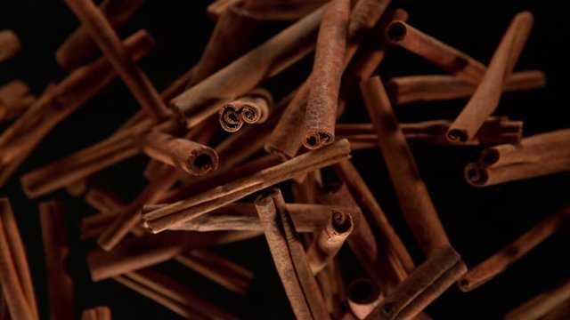 Super Slow Motion Shot of Cinnamon Explosion on Black Background at 1000fps.