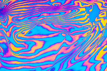 Fototapeta na wymiar Abstract trendy neon colored psychedelic fluorescent striped zebra textured neon background