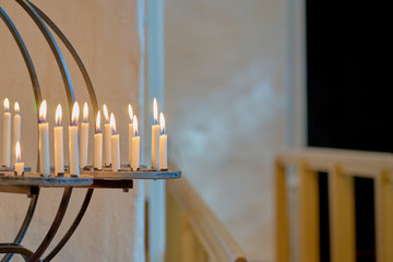 Candels in a church background. Copy space.
