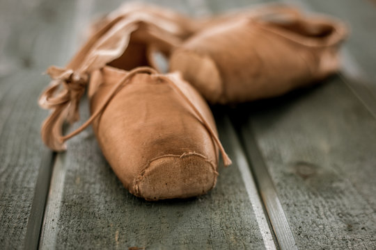 Old and used ballet slippers