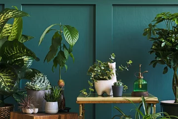 Tuinposter Modern composition of home garden filled a lot of beautiful plants, cacti, succulents, air plant in different design pots. Stylish botany interior. Green wall paneling. Template Home gardening concept © FollowTheFlow