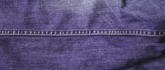 Naklejka premium Blue jeans denim texture for background and design plan.