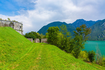Sightseeing at the beautiful landscape of lake Idro Rocca d'Anfo Italy, ruins of a old bunker