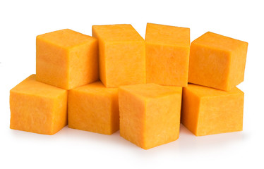 pile of pumpkin pieces on a white background