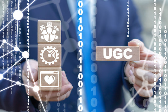 Modern user presents UGC concept on wooden blocks. User Generated Content Social Media Internet Network Technology.