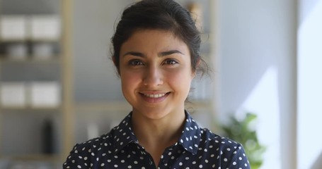 Smiling indian woman pretty face looking at camera, closeup portrait - Powered by Adobe