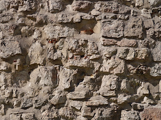 Masonry old stone wall texture, background