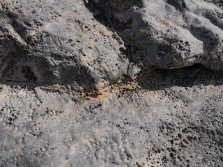 Rough stone surface background, texture
