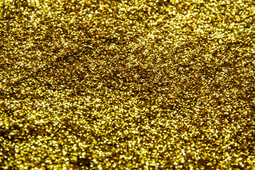 a composition with  beautiful gold glitter. Background and texture of gold glitter. Luxury gold glitter sparkle shining texture background