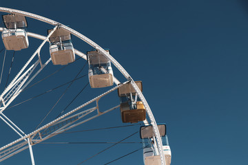 Ferris Wheel Over Blue Sky