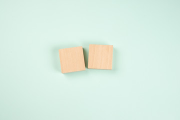 wooden cubes on a color background, blocks under the characters or digits, two dice, a photo to a date, the date