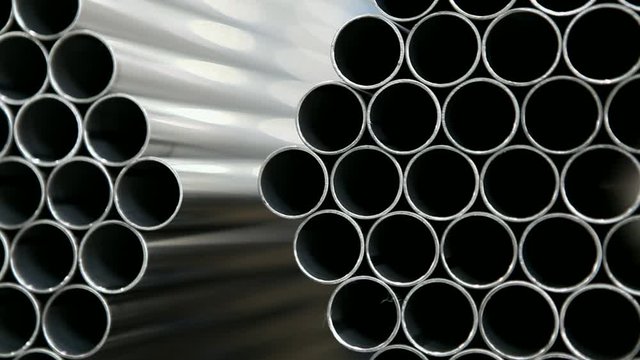 steel metal pipes on stack