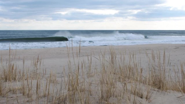 Rough seas and waves breaking on beach on Jersey shore