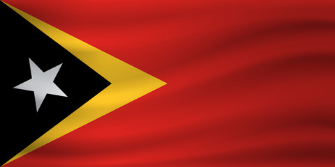Waving flag of East Timor. Vector illustration