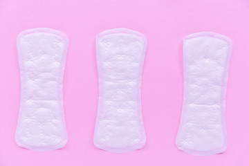 Three daily women's gasket on pink background.