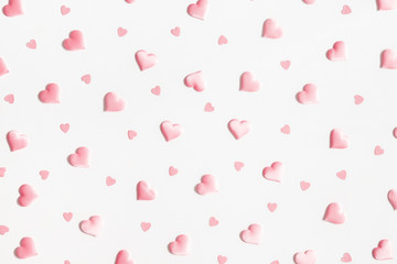 Valentine's Day background. Pink hearts on white background. Valentines day concept. Flat lay, top...