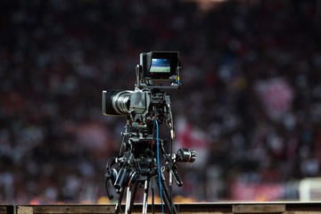 TV camera at the stadium during football matches