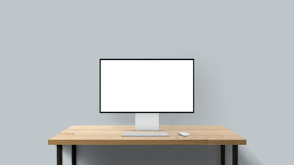 New desktop computer pro display with keyboard and mouse on wooden desk. Modern blank flat monitor screen. Modern creative workspace background. Front view.