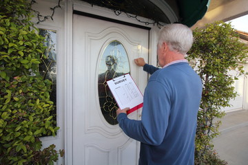 Man taking survey, door to door