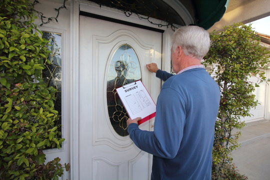 Man Taking Survey, Door To Door