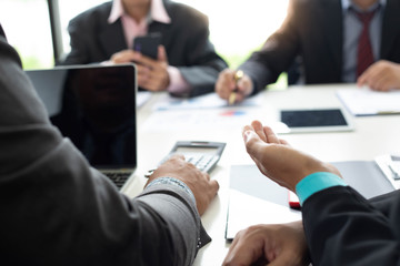 Businessman team is analyzing the cost of housing projects to live with lifestyle.business concept, soft focus, vintage tone