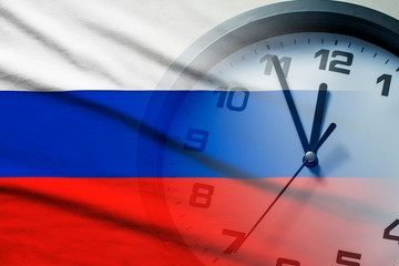 Russia flag with dial of a clock