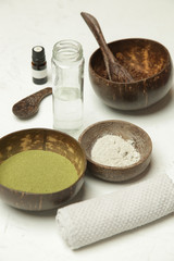 Making homemade green clay facial beauty mask