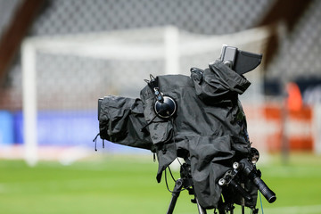 Fototapeta premium TV camera at the stadium during football matches