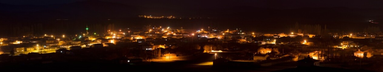 Fototapeta na wymiar Panoramic view of Night Landscape of a Beautiful Small Town in Turkey.