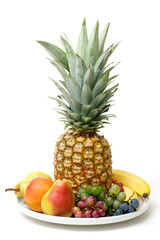 Fototapeta na wymiar Fruit Dish with Whole Pineapple