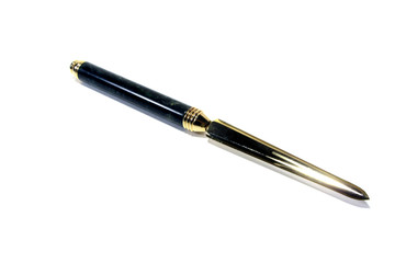 A metallic office knife on a white background.     