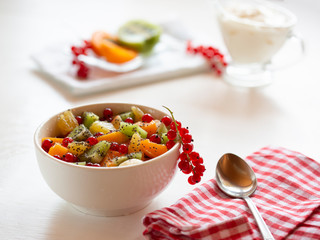 .Diet, healthy fruit salad in a white bowl-healthy Breakfast, weight loss concept.