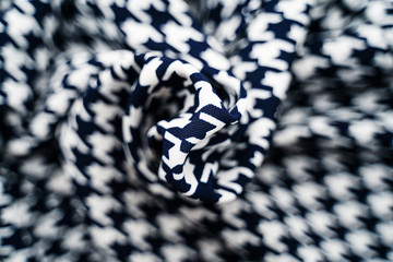 Fabric with goose foot pattern. Crumpled fabric background
