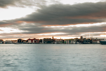 Naklejka premium Fotografías en el puerto de valencia y en la playa de la Malvarrosa en el atardecer