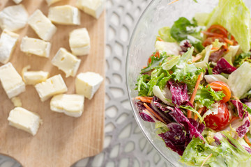 Healthy breakfast of fresh salad and cheese