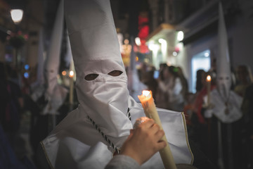 Nazarene in a procession at the holy week in Marbella