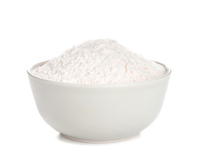 Bowl with flour on white background
