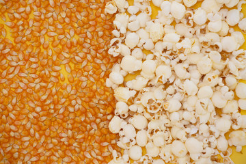 Corn kernels and popcorn, snacks in the house or cinema on a yellow background