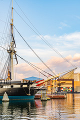 Obraz premium Baltimore, Maryland, US - September 4, 2019 View of Baltimore Harbor with USS Constellation Ship and office buildings