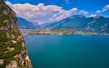 Fototapeta na wymiar Panoramic view of the beautiful Lake Garda and Riva del Garda town in the summer time , Trentino Alto Adige region,Italy