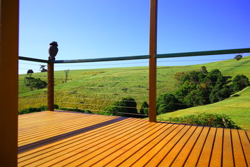 wooden deck look out to the mountain landscape