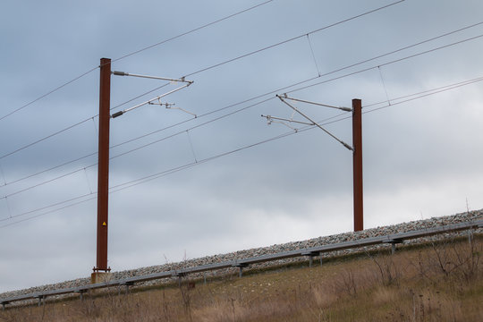 Overhead live electric railway train power supply