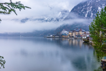 Hallstatt diveded between its lake, the sky and the clouds