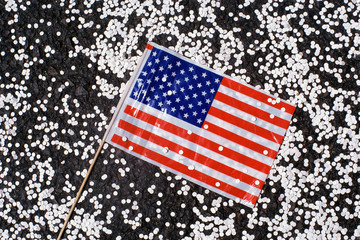 Small American flag with confetti